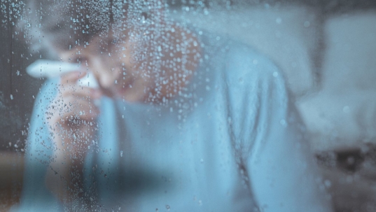 sad elderly person at nursing home